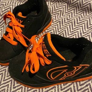 Boys Size 1 Heelys Black and Orange shoes. Barely worn